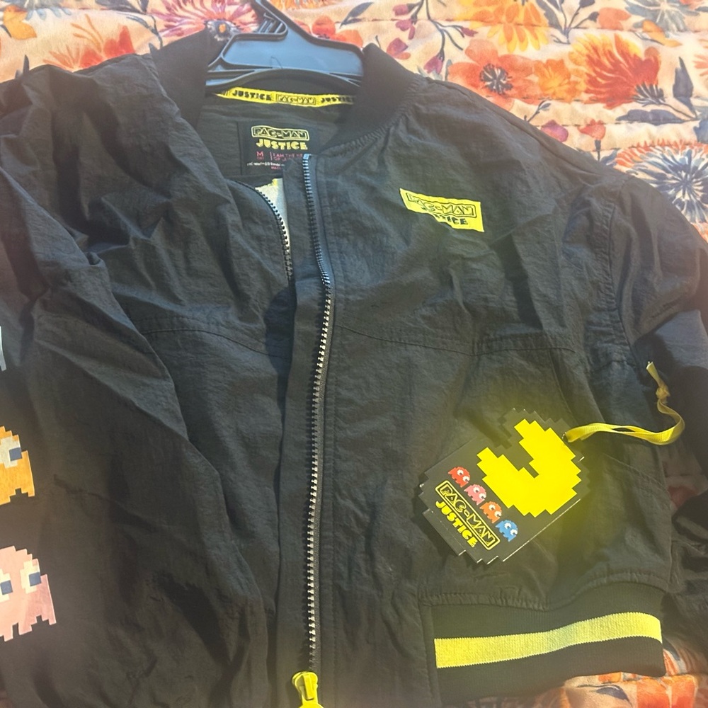 Justice Black Jacket with Yellow and Pink Pac-Man Design
